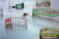 Colorful Fishing Nets and Boat in Tranquil Waters