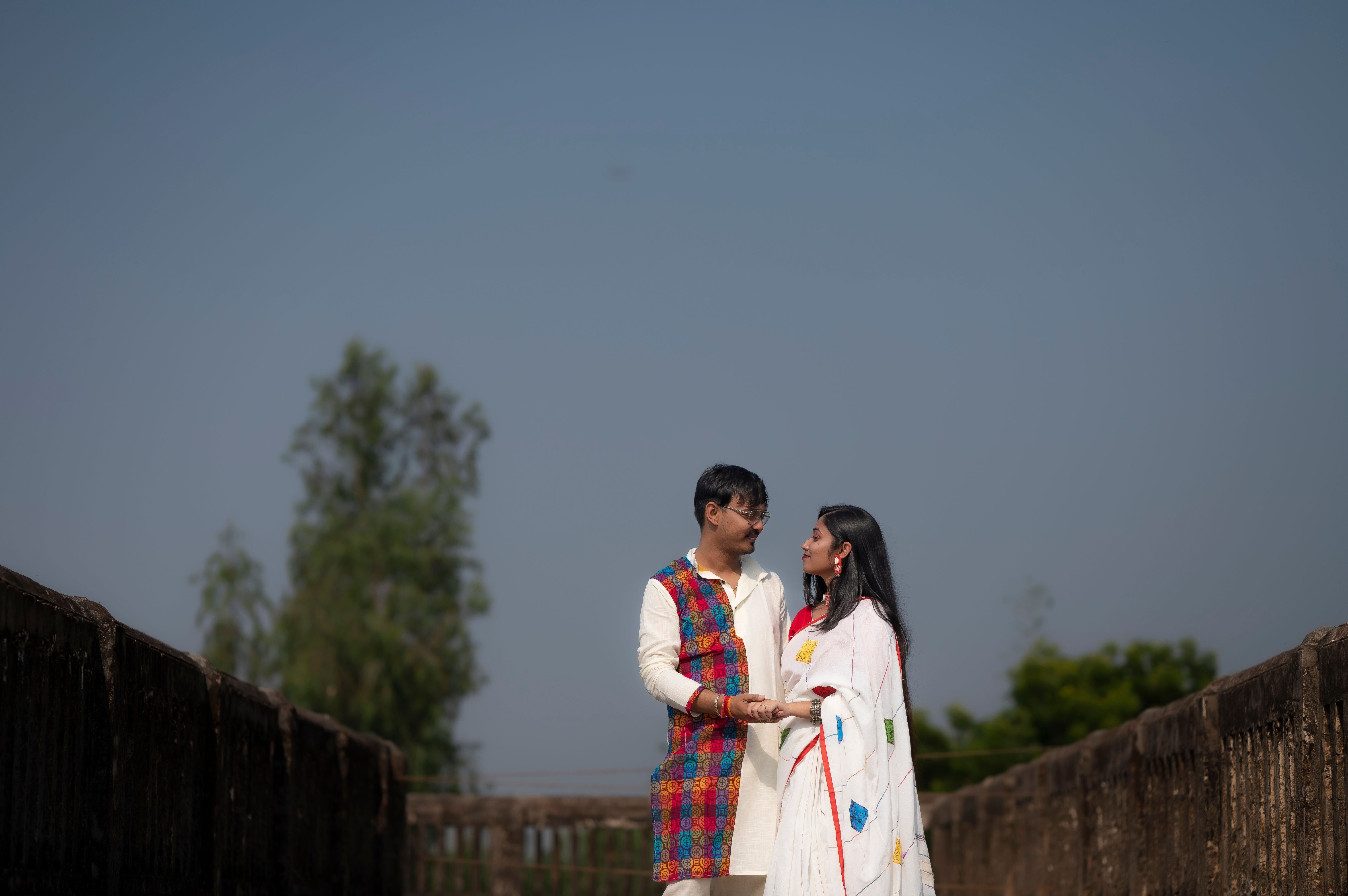 Romantic Couple in Traditional Indian Attire Outdoors · Free Stock Photo