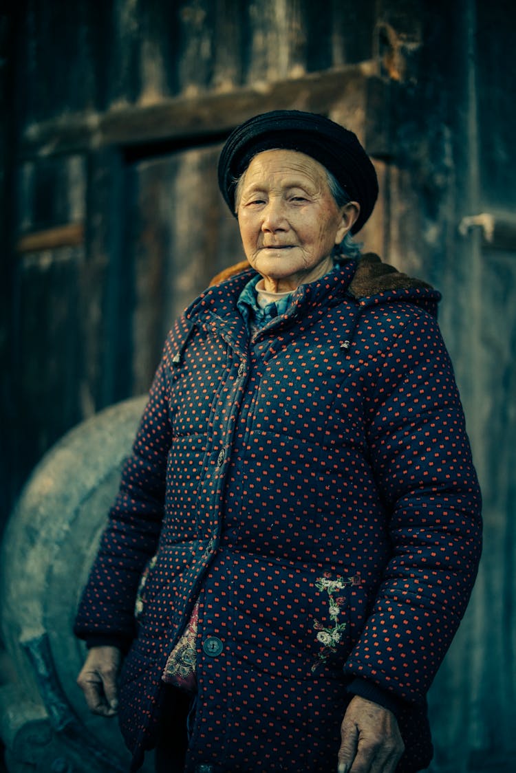 Portrait Of A Senior Woman Wearing A Polka Dot Jacket