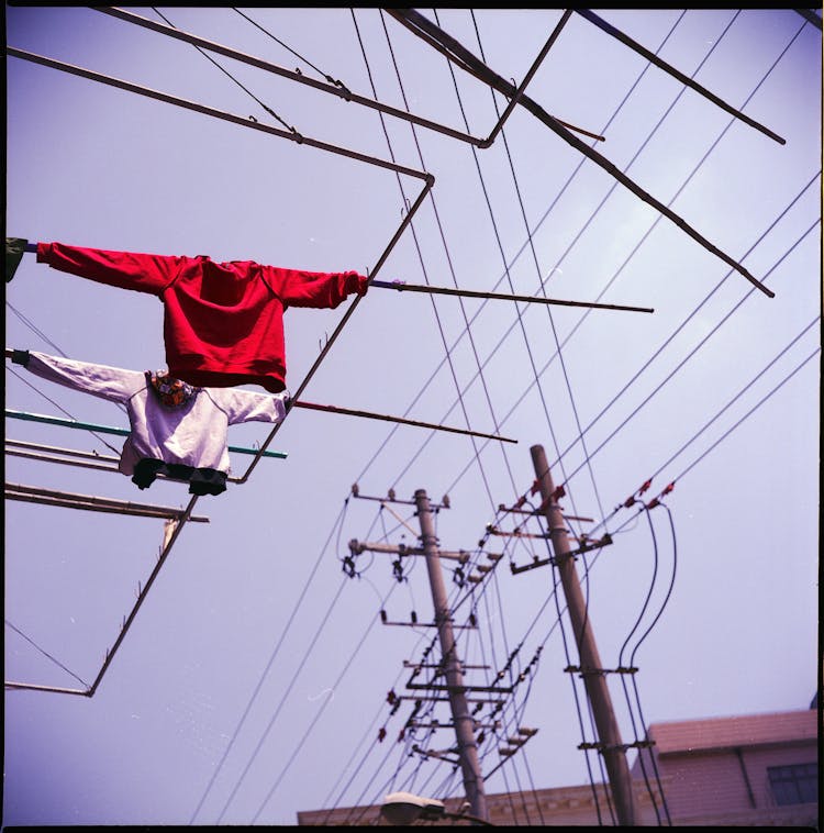 Clothes Hanging On Electricity Lines 