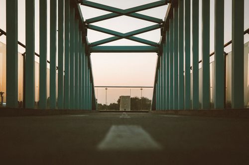 Free Modern pedestrian bridge with sunset view in Abu Dhabi. Perfect for architectural exploration. Stock Photo