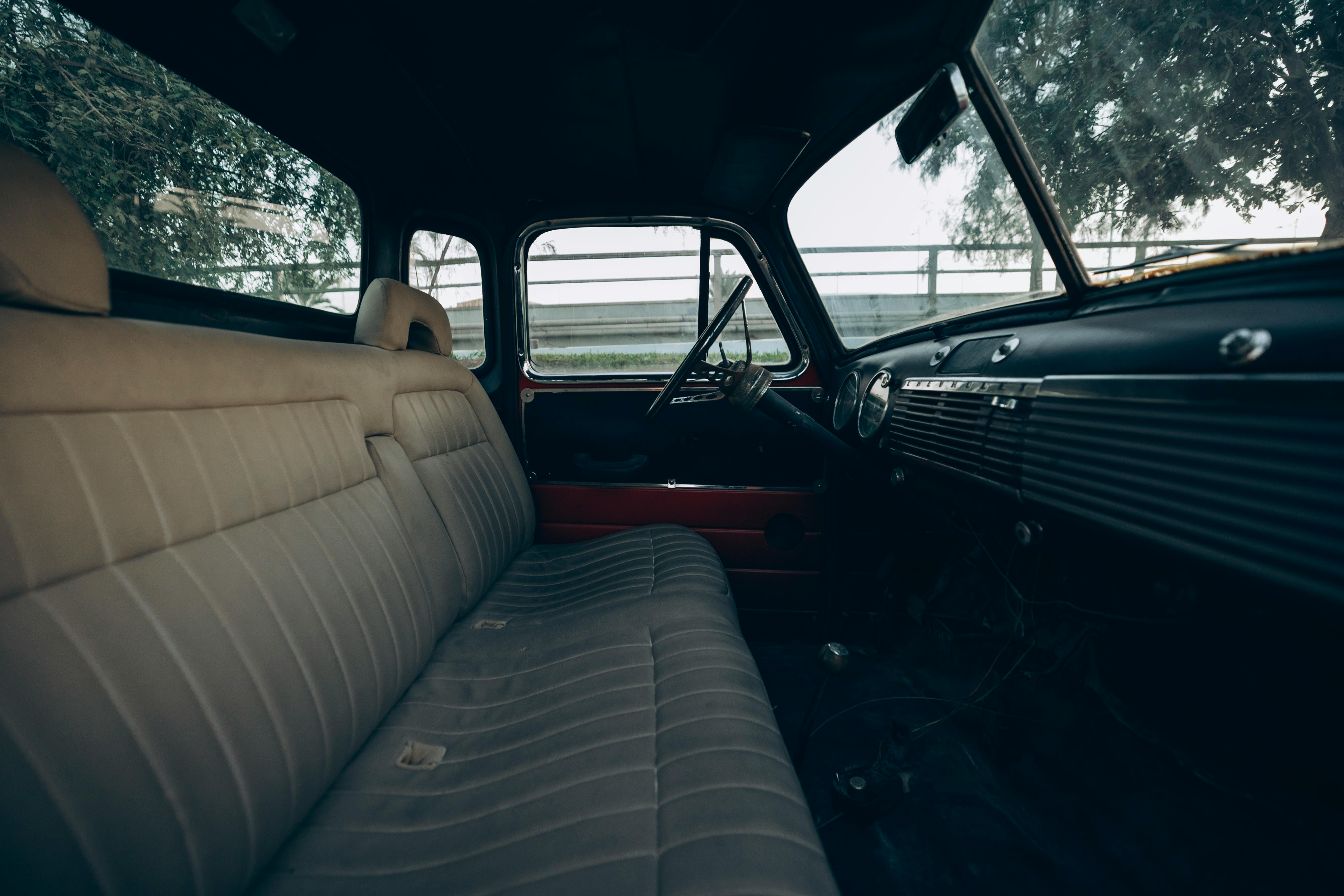 Interior view of a classic vintage car showcasing Abu Dhabi's rich heritage.
