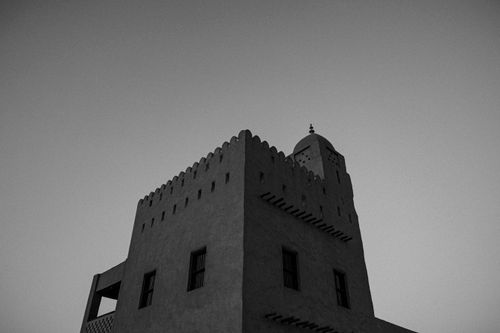 Free Black and white photo of traditional Arabian architecture in Abu Dhabi taken at twilight. Stock Photo