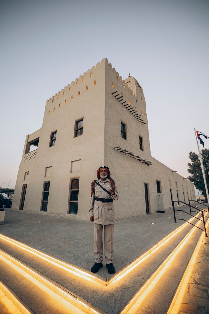 Guard standing before the Qasr Al Hosn fort in Abu Dhabi