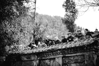 People Standing on an Old Bridge Looking at the View
