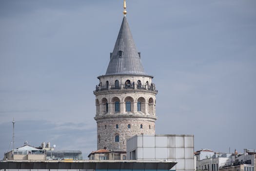 Majestic view of the historic Galata Tower in Istanbul against a bright sky. Iconic architecture.