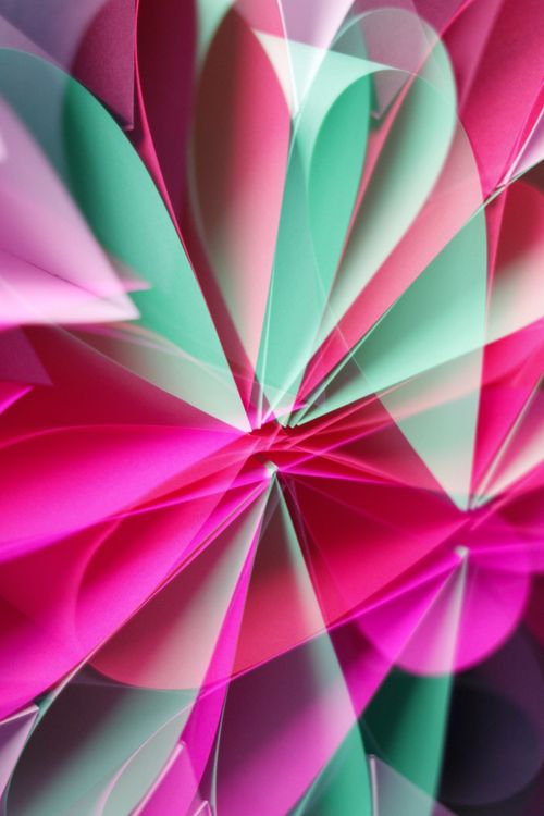 Free Vibrant abstract composition of folded paper in vivid pink and green hues. Stock Photo