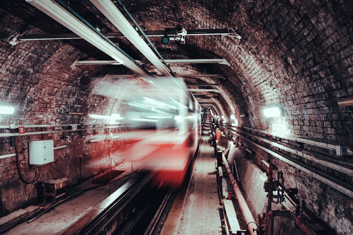 Long Exposure Photography of White and Red Train