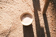 Minimalist Coffee Cup on Textured Rug