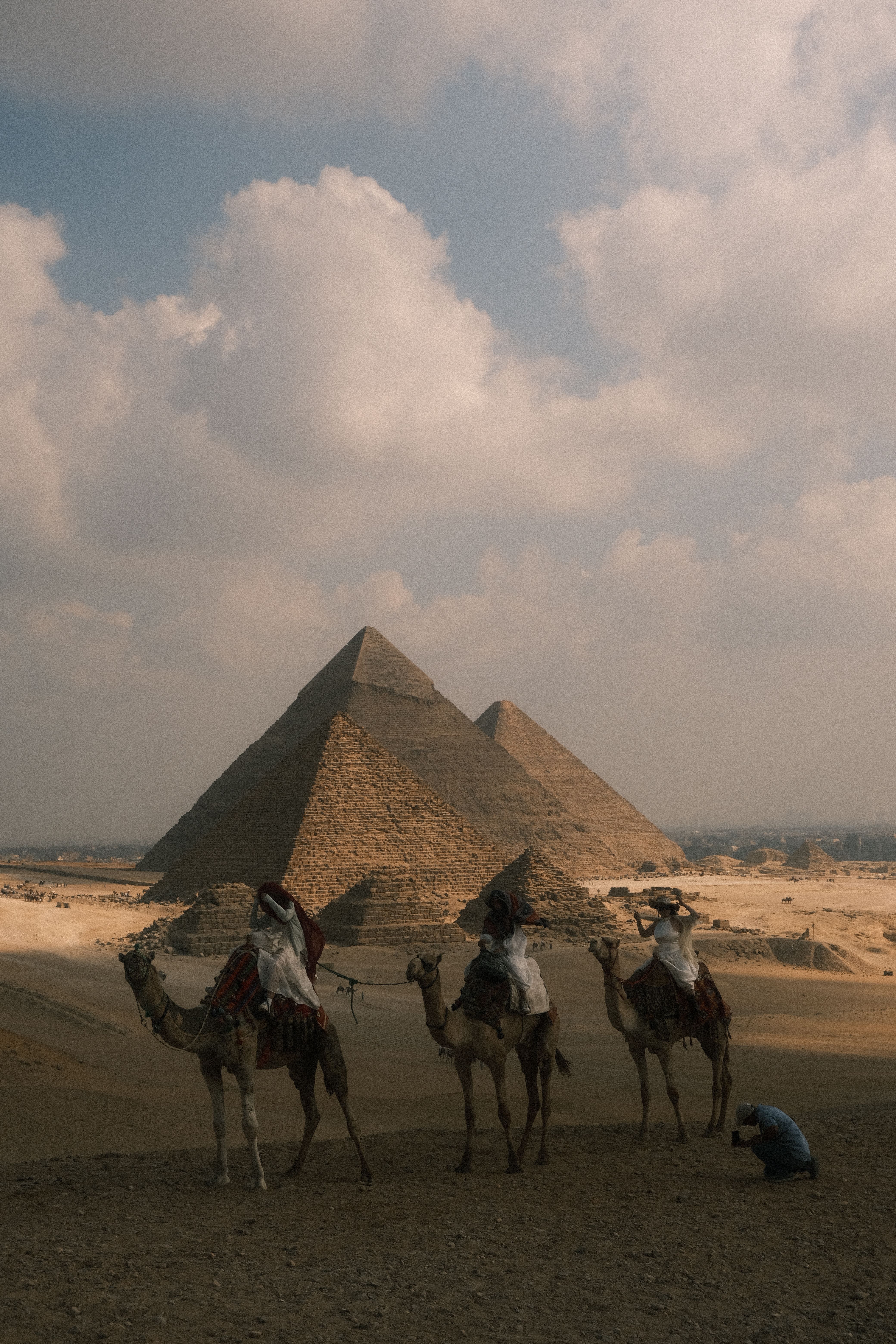 Camel Riders at the Giza Pyramids · Free Stock Photo
