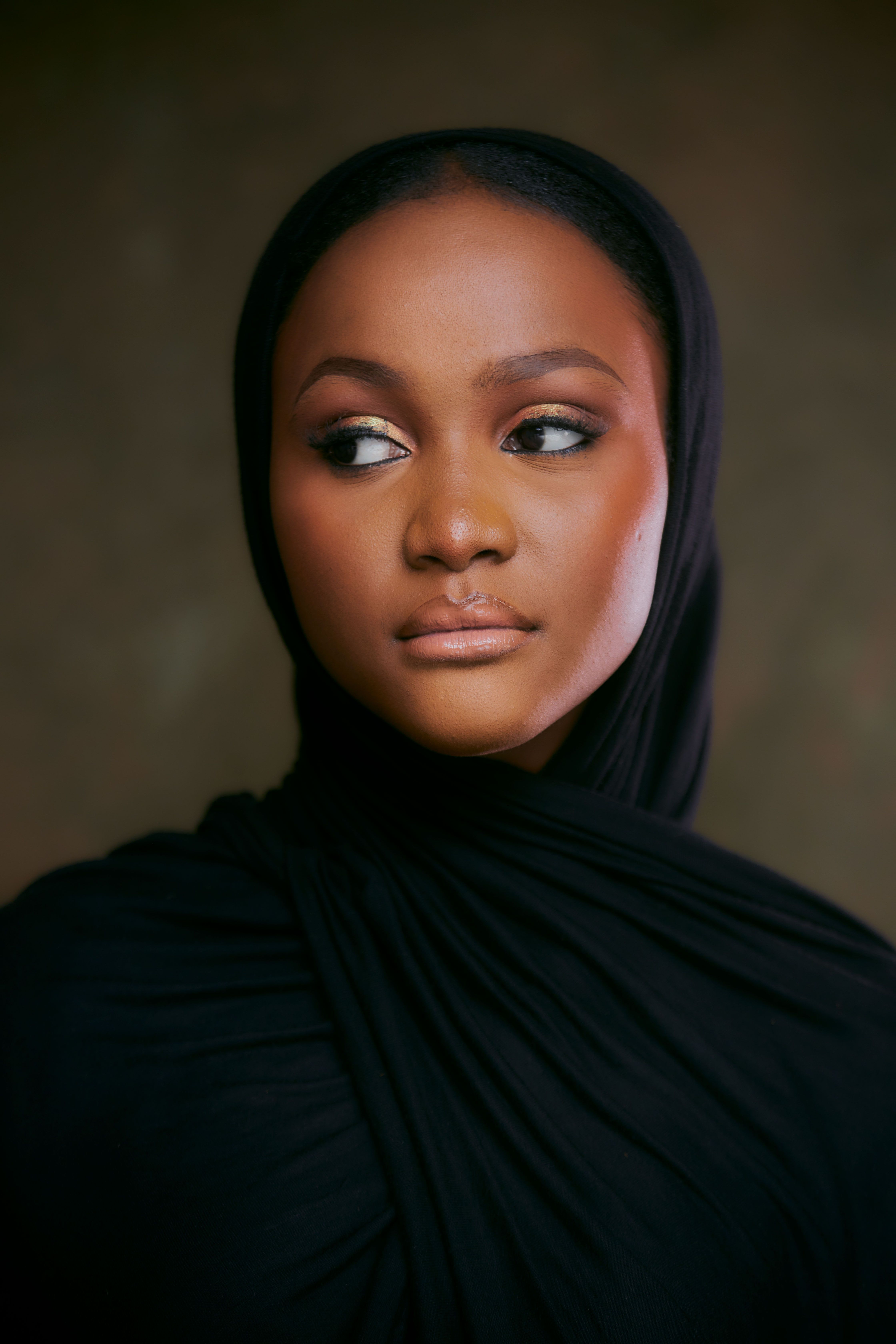 Elegant Portrait of Woman in Black Hijab · Free Stock Photo
