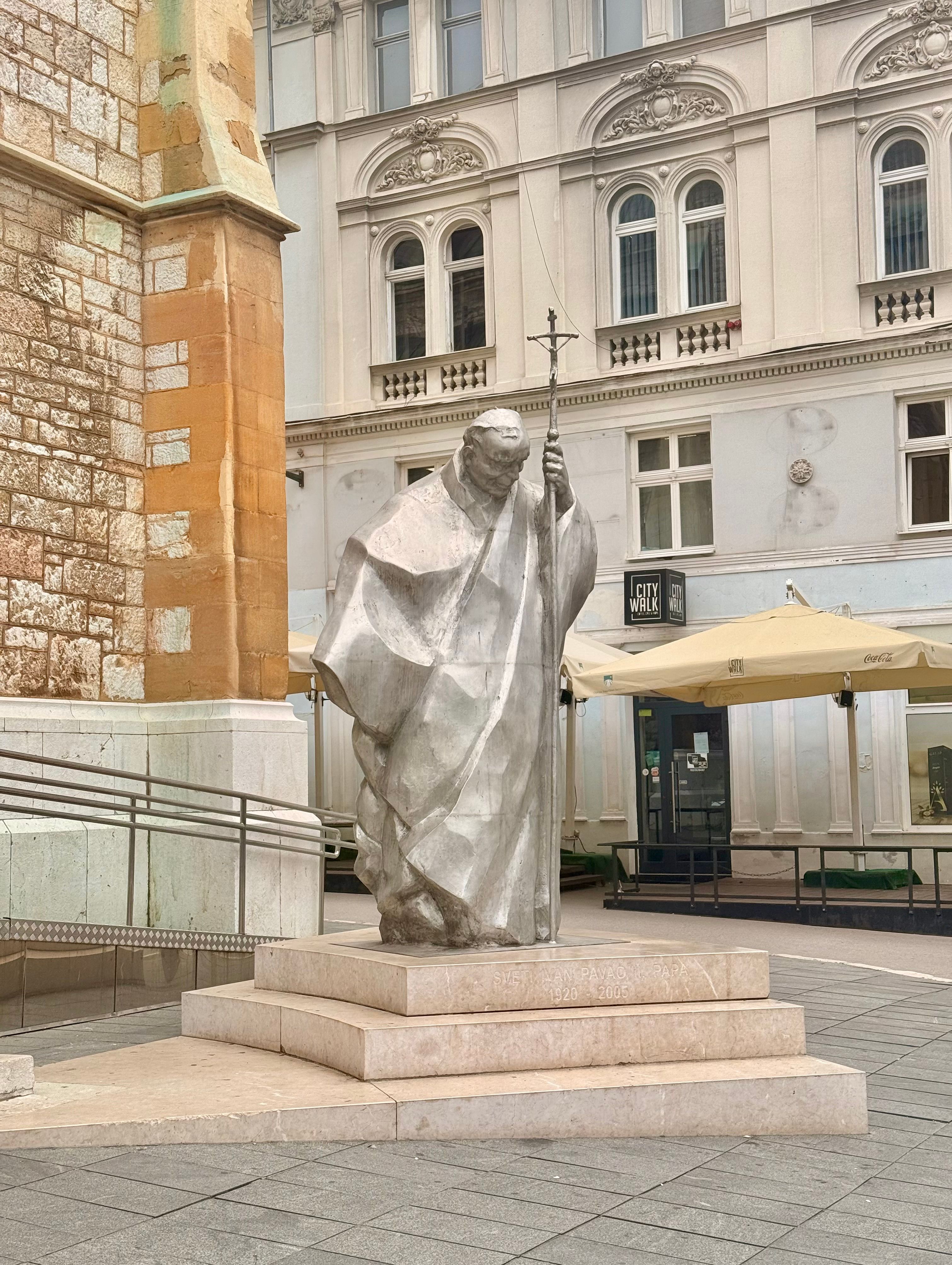 Statue of Pope John Paul II outside the Sarajevo Cathedral.