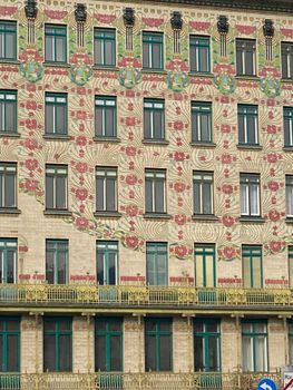 Vibrant Art Nouveau architecture featuring intricate floral designs on a Vienna building facade.. pexels, vibrant, nouveau