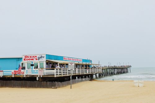 Free Oceanfront view of Ocean Eddie's Seafood Restaurant on a Virginia Beach pier. Stock Photo