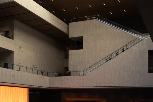 Free A contemporary architectural space with an elegant escalator and minimalistic design. Stock Photo