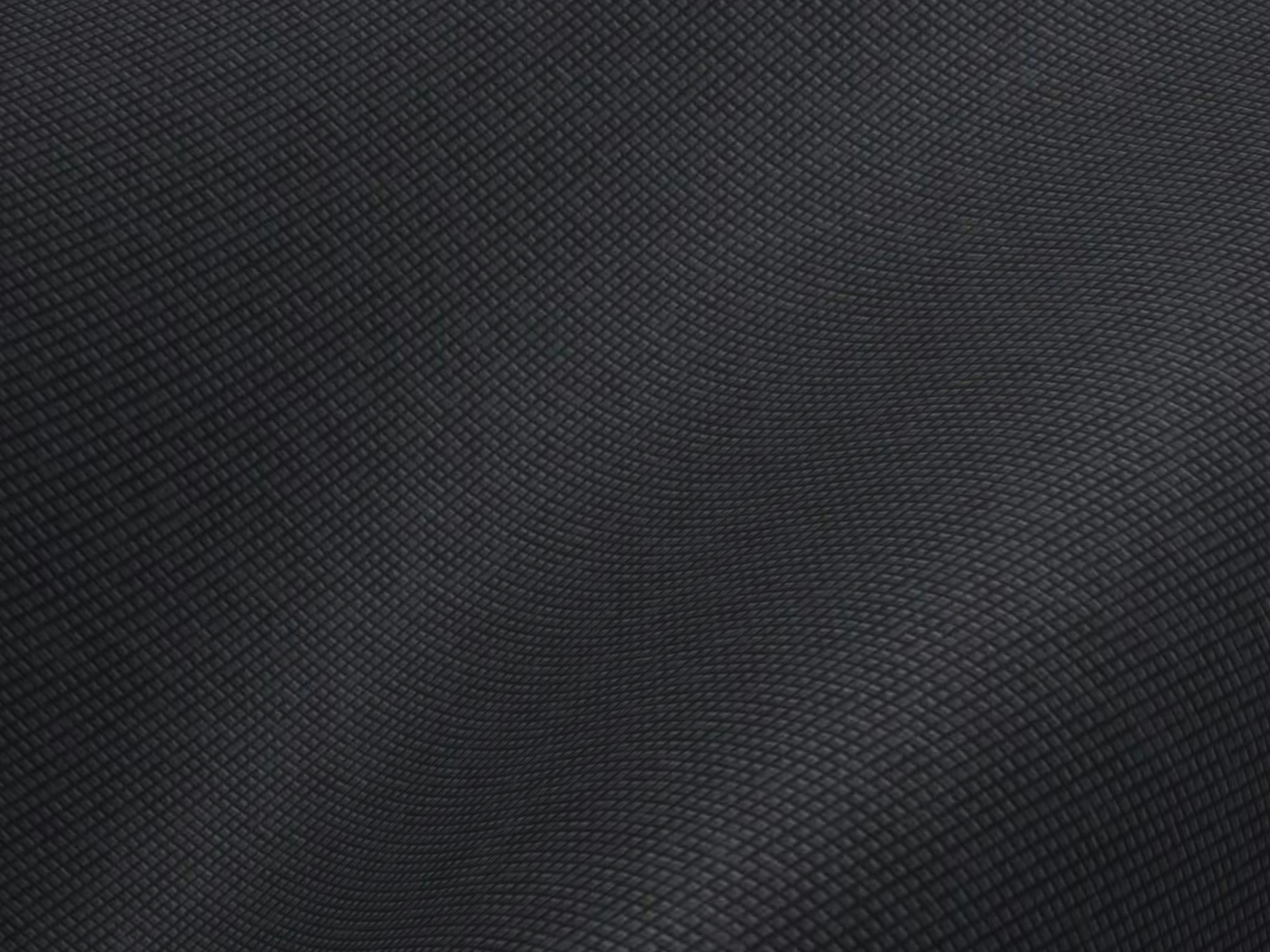 gratis Close-up van abstract getextureerde stof met een donker kleurenpalet en een klein rasterpatroon. Stockfoto