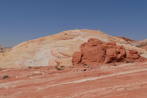 Free Beautiful red rock formation in a desert setting under a clear blue sky. Stock Photo