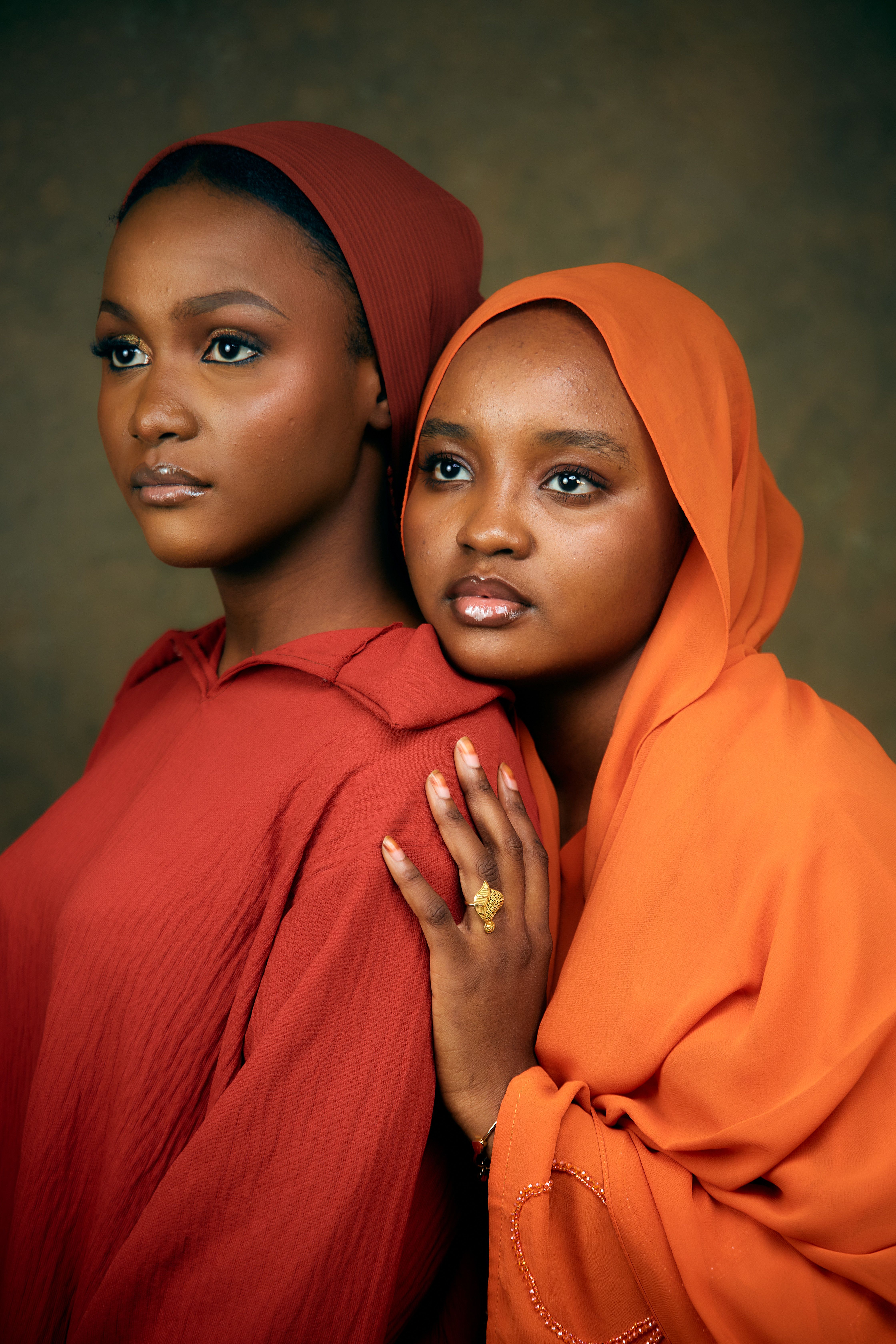 Elegant Portrait of Two Women in Traditional Attire · Free Stock Photo