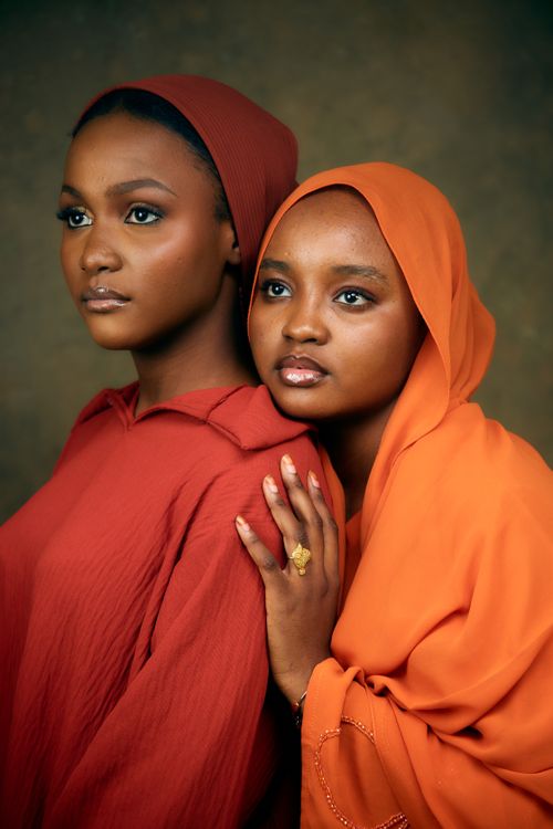 Elegant Portrait of Two Women in Traditional Attire · Free Stock Photo