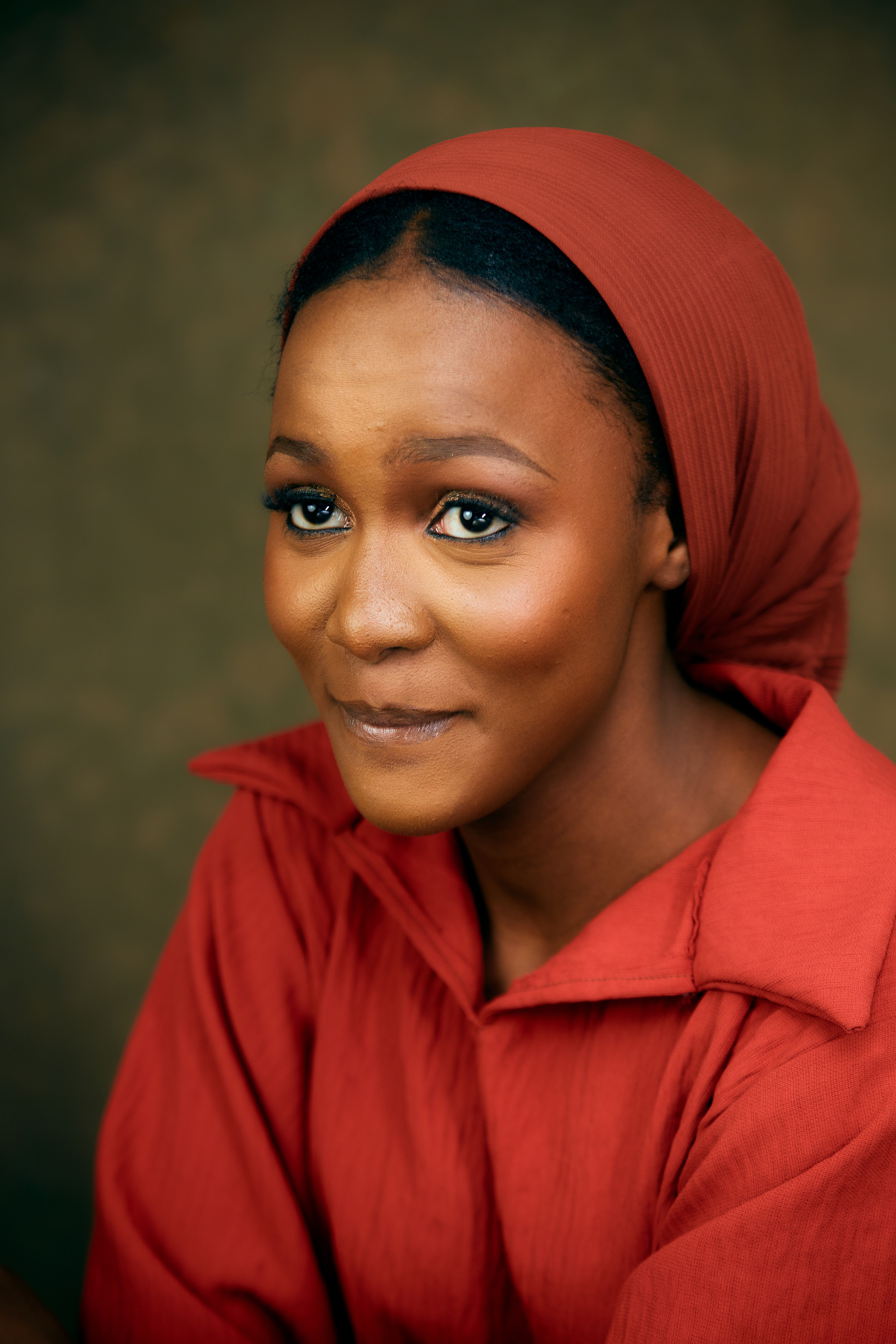 Elegant Portrait of a Woman in Red Attire · Free Stock Photo