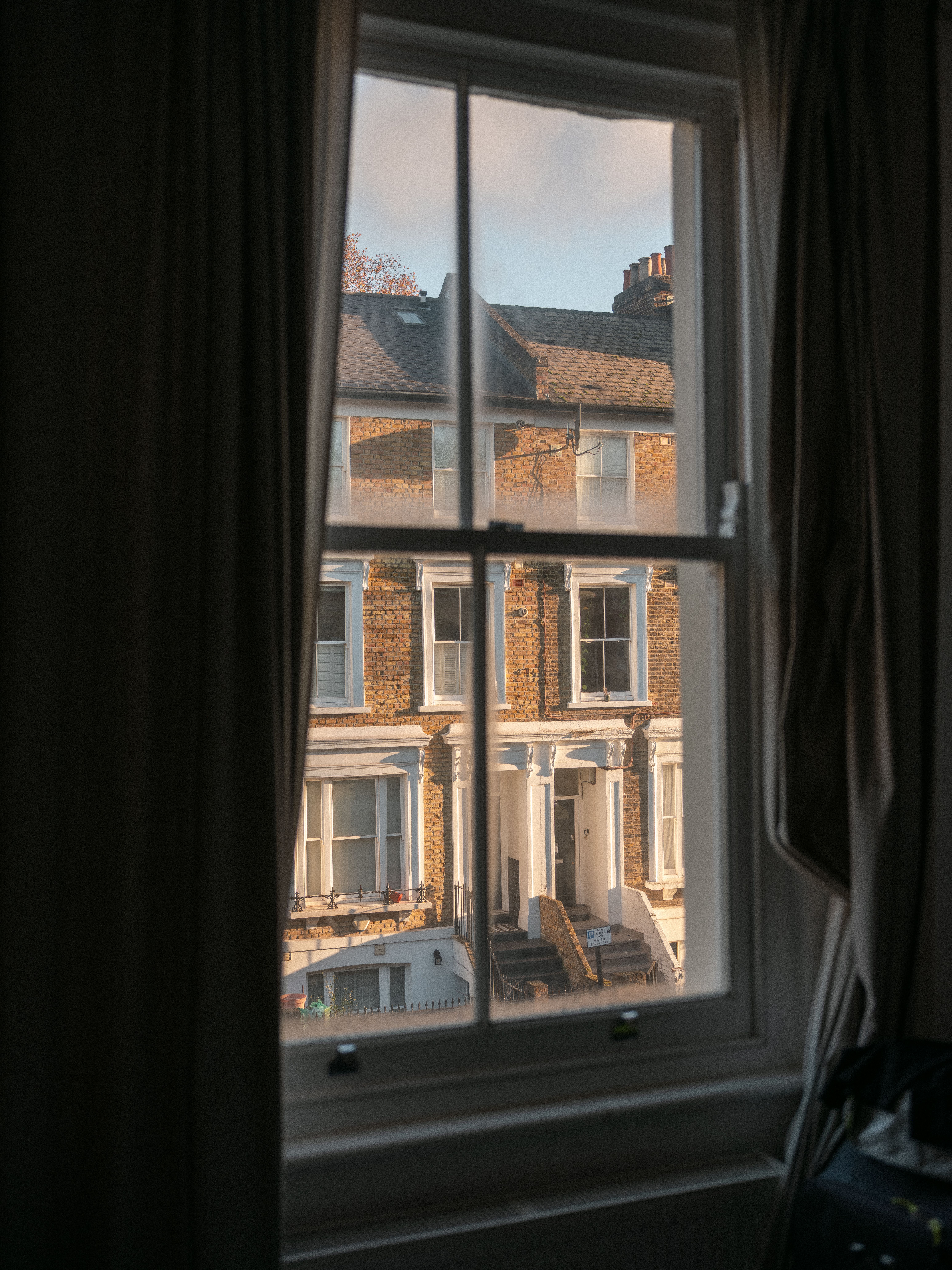 Charming Victorian House View from Window · Free Stock Photo