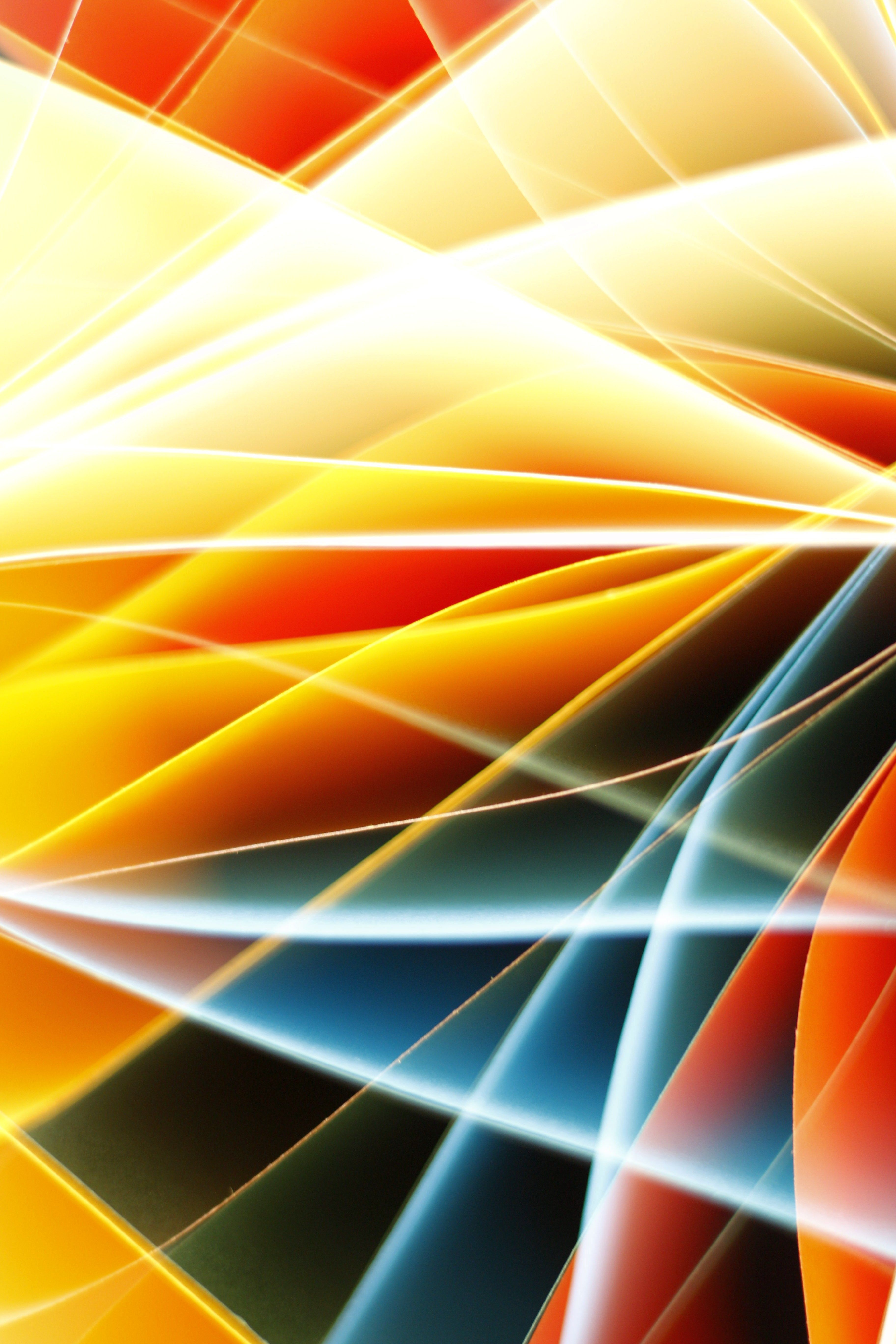 Dynamic abstract image of colorful light streaks and patterns.