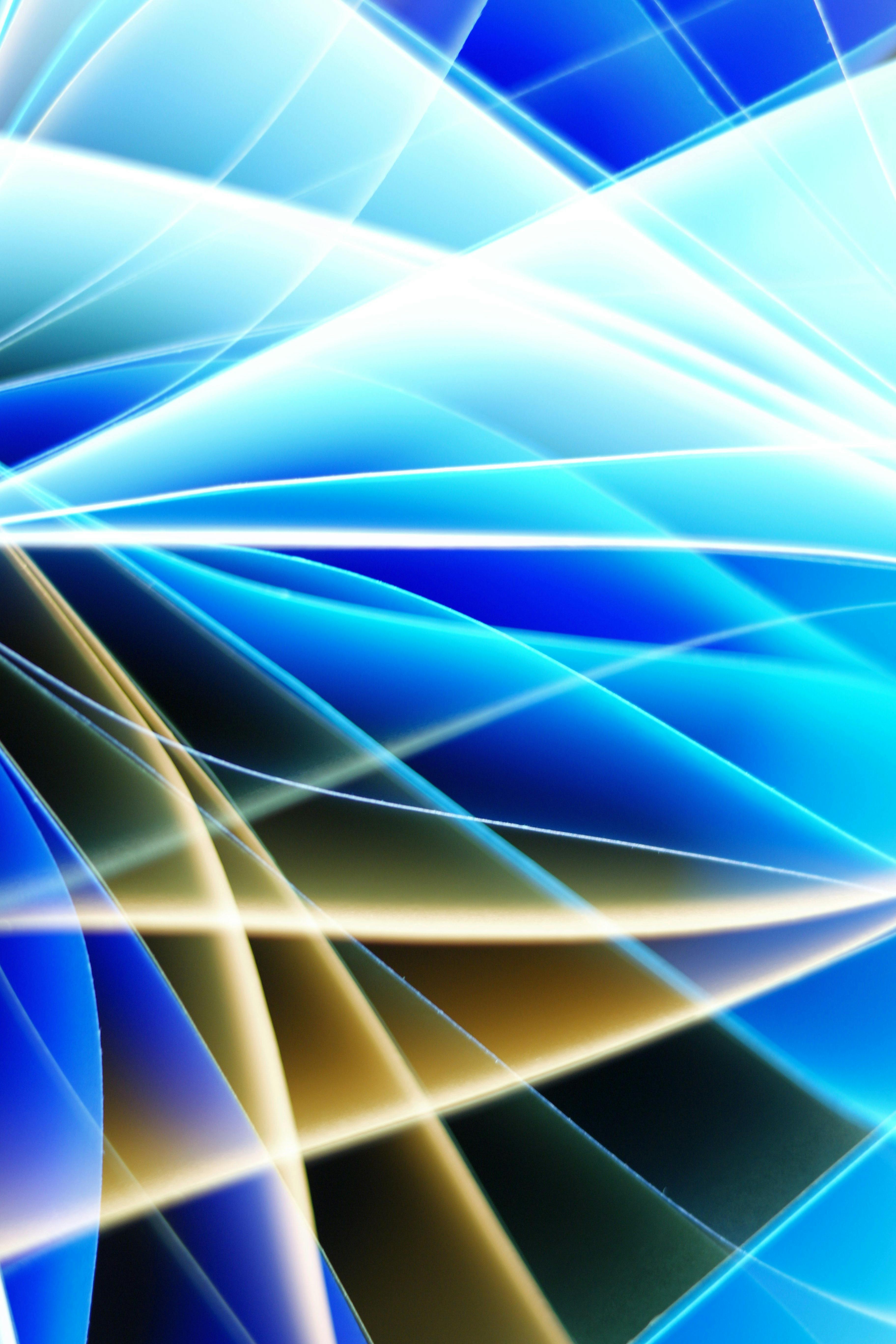 Dynamic abstract image with radiant blue light streaks and vibrant patterns.
