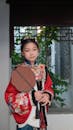 Young Girl in Traditional Chinese Attire