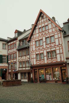 Scenic view of traditional half-timbered houses and cobblestone streets in Mainz, Germany.