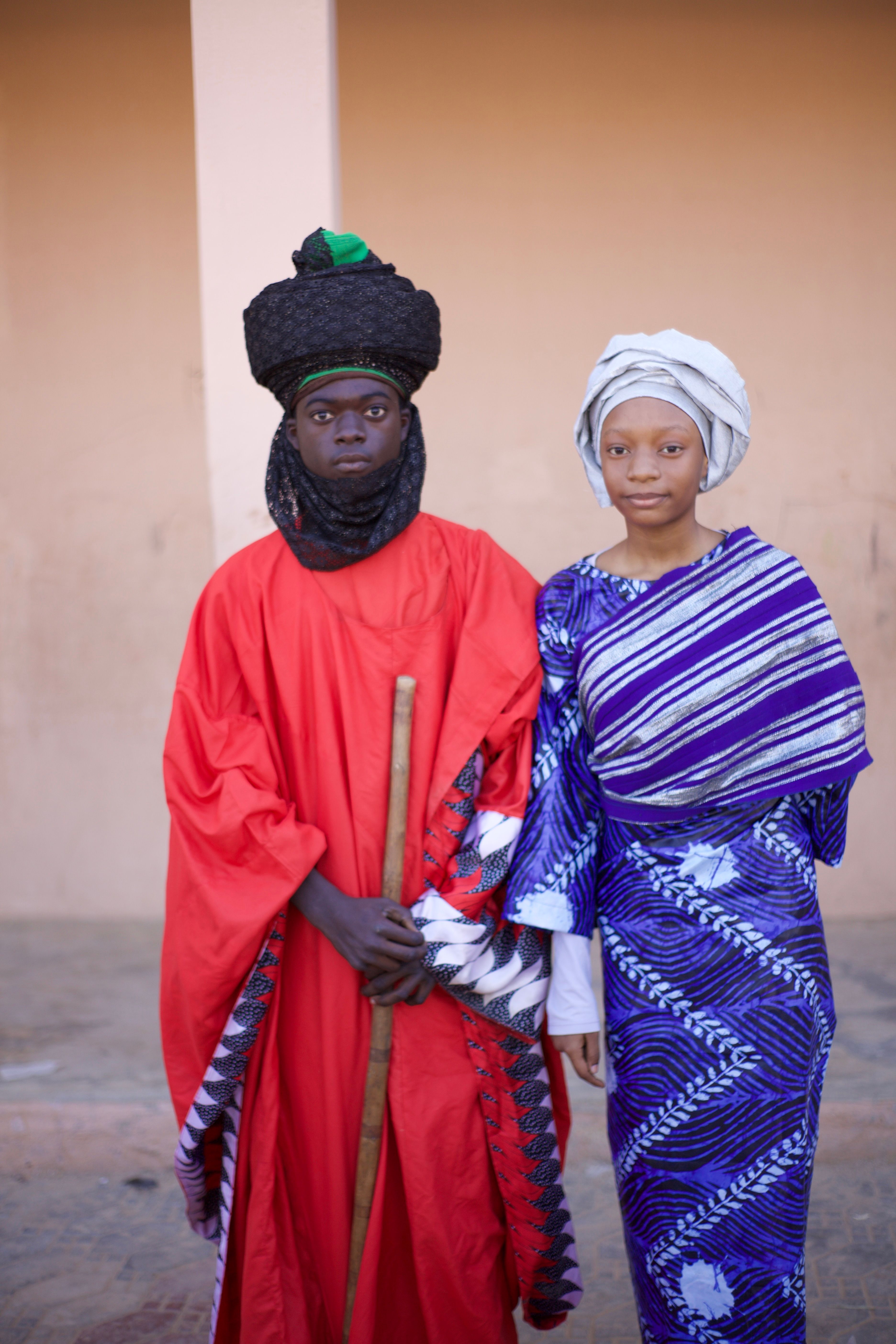 Cultural Attire Portrait of Two People Outdoors · Free Stock Photo