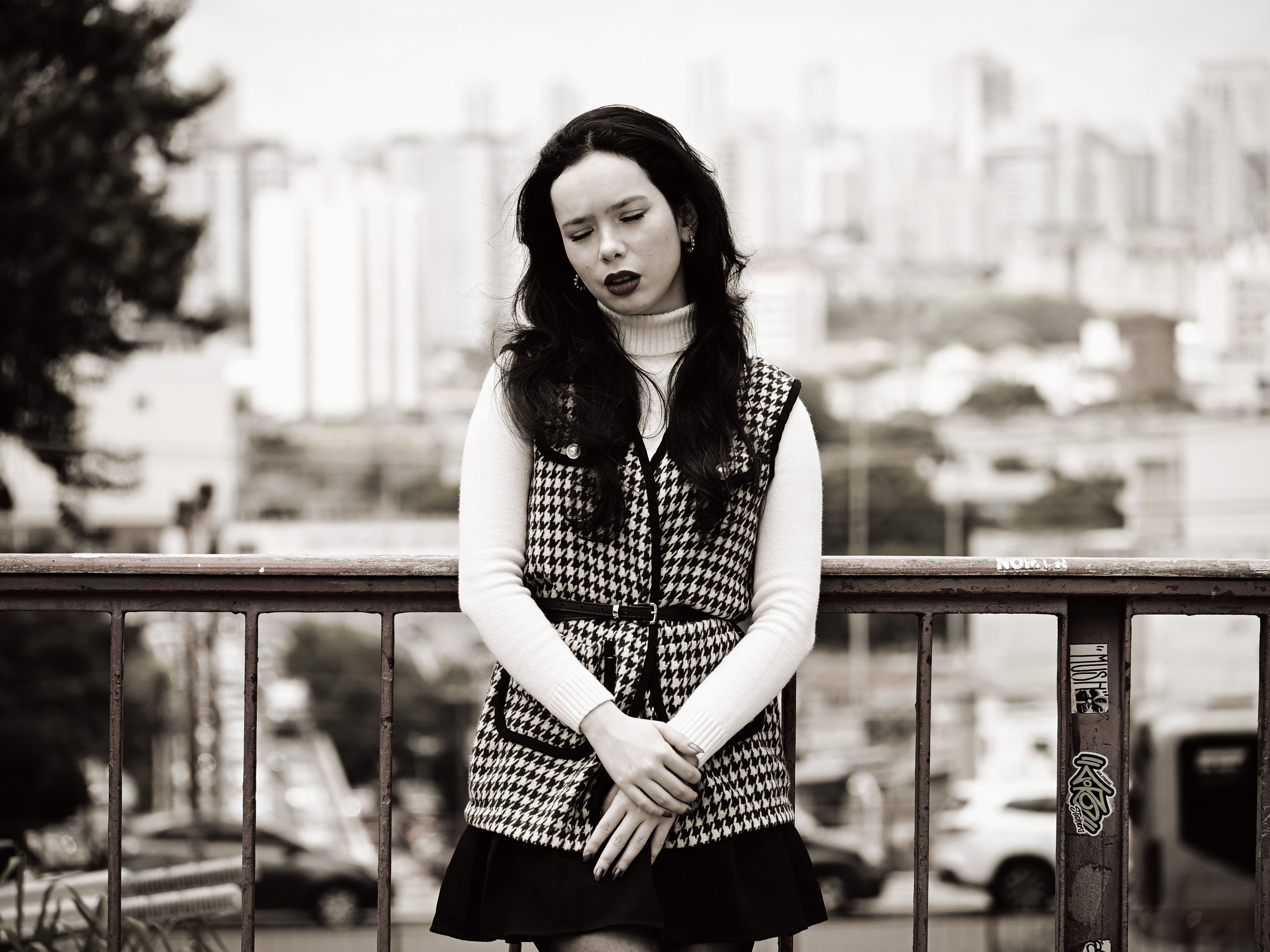 Pensive Woman on Urban Bridge · Free Stock Photo