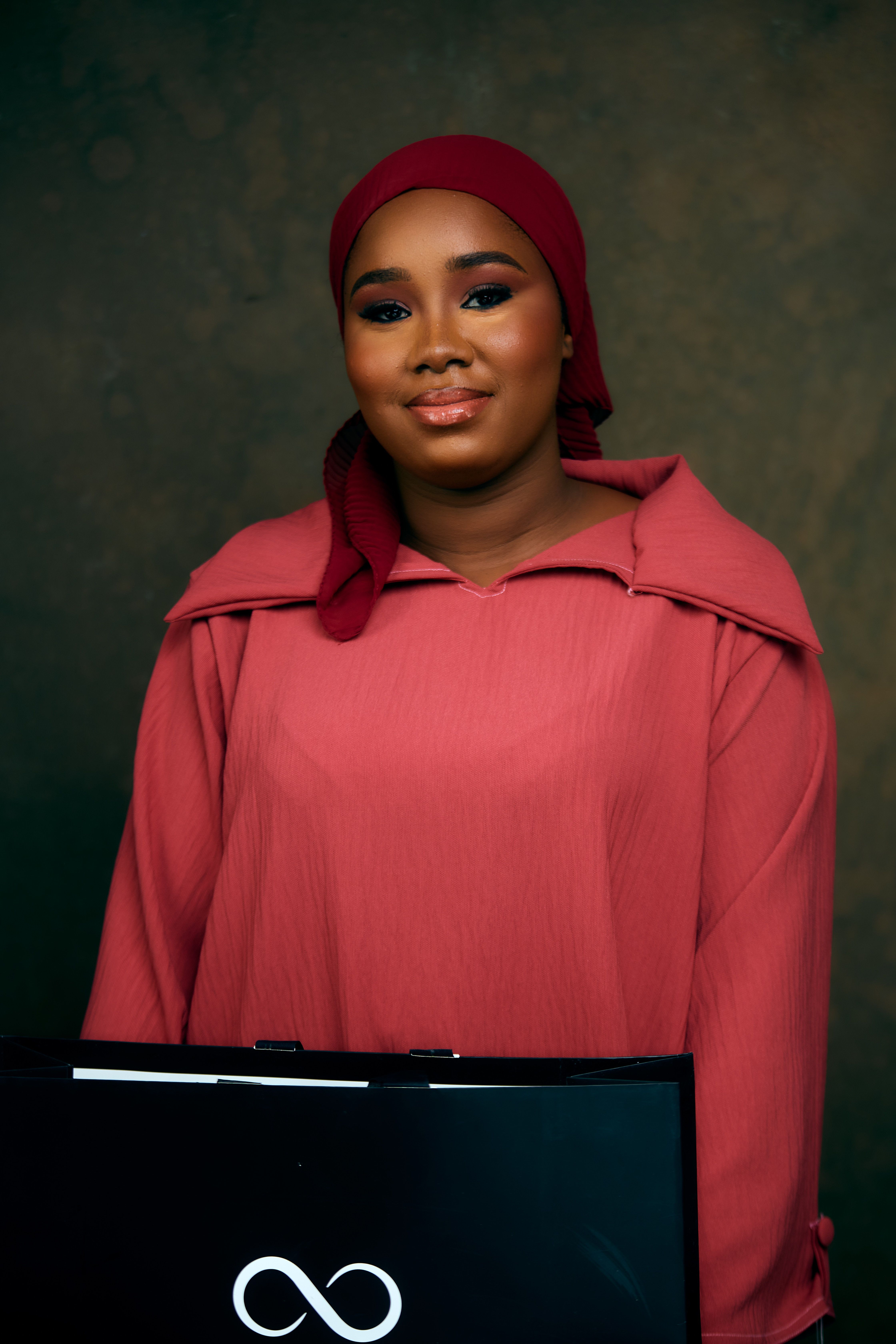 Elegant Young Woman in Red Hijab Portrait · Free Stock Photo