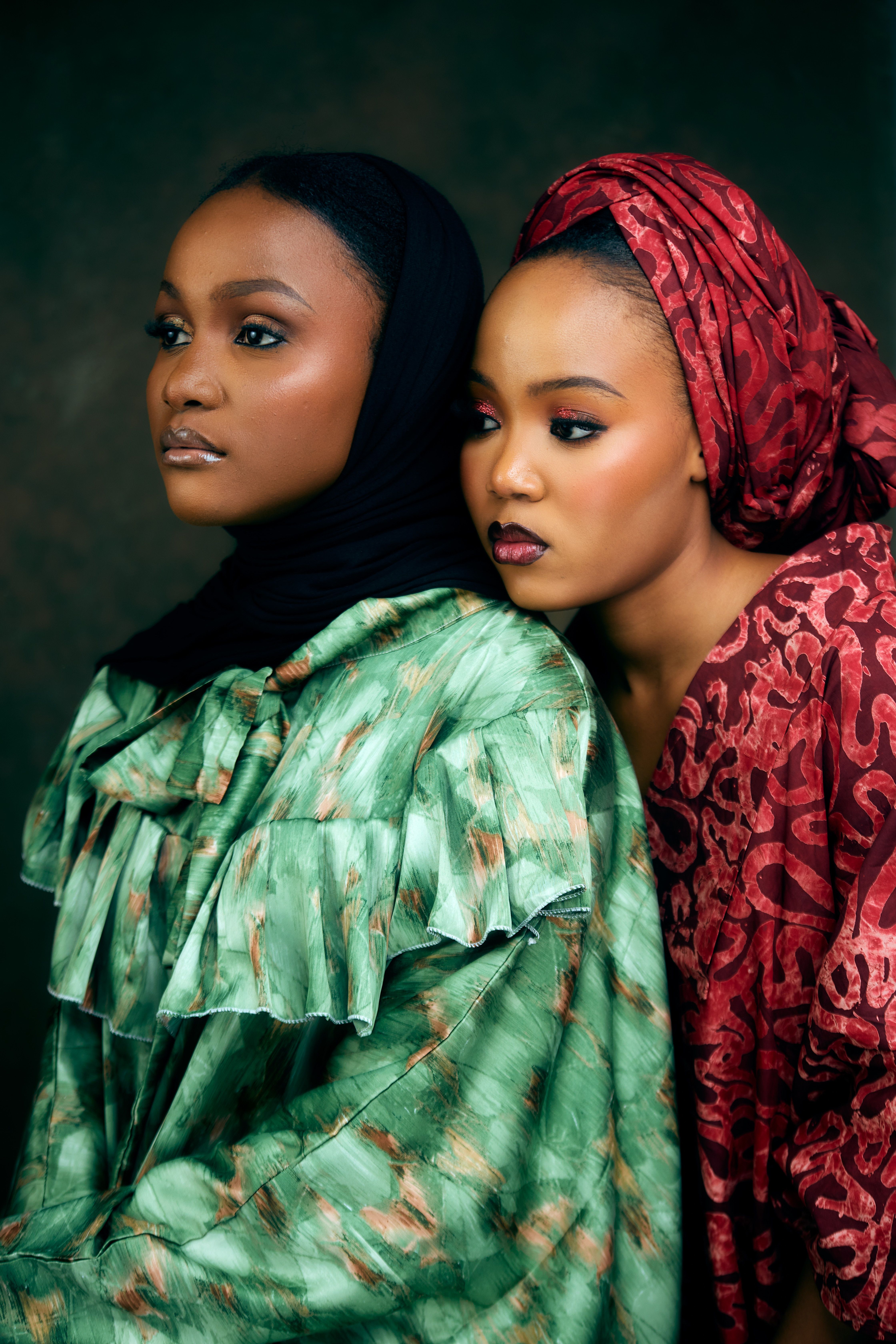 Elegant Portrait of Two Women in Traditional Attire · Free Stock Photo