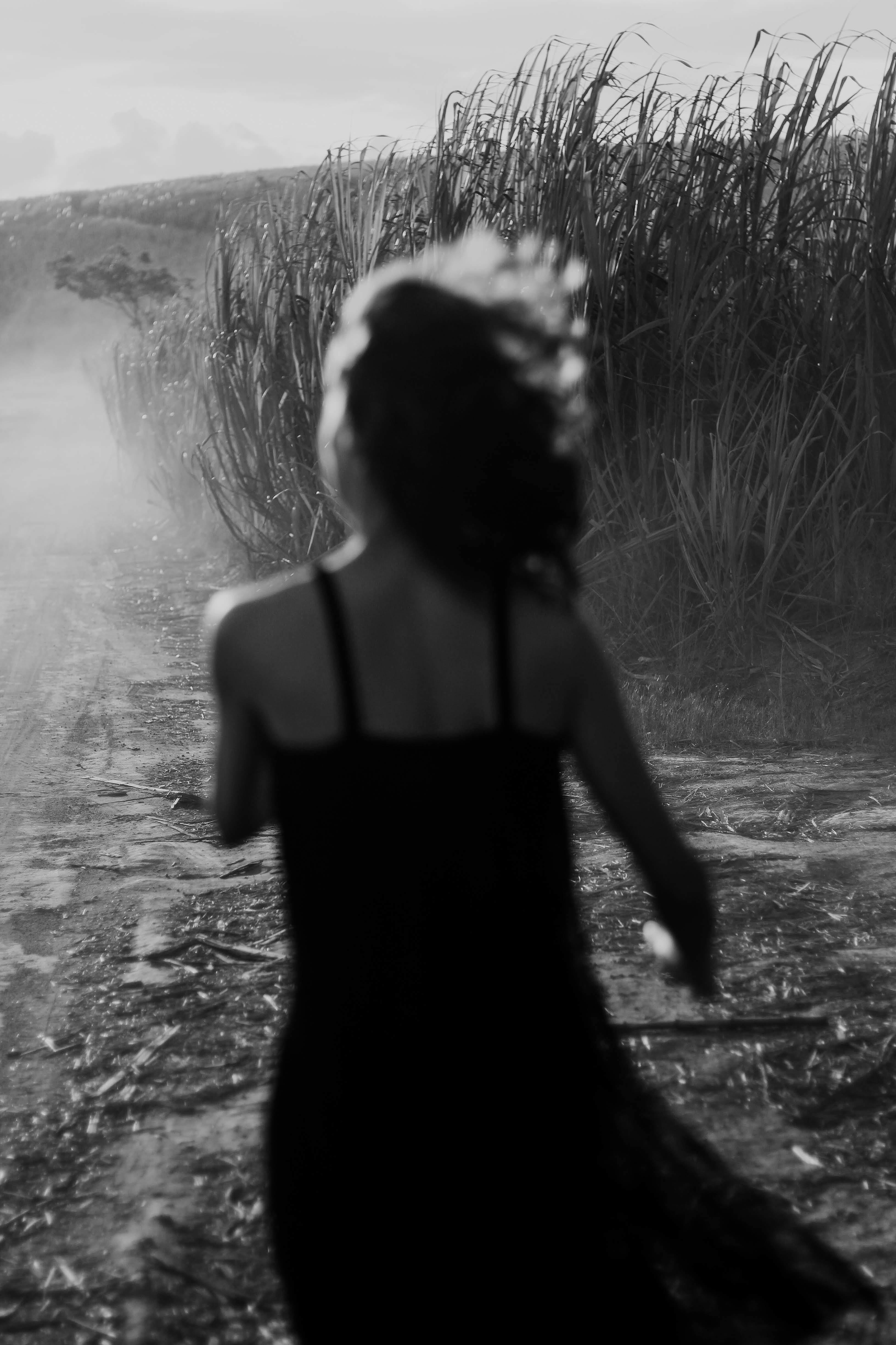 Grayscale Photography of Woman Wearing Sleeveless Dress · Free Stock Photo