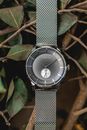 Close-Up Photo of Silver-colored Watch With Milanese Strap