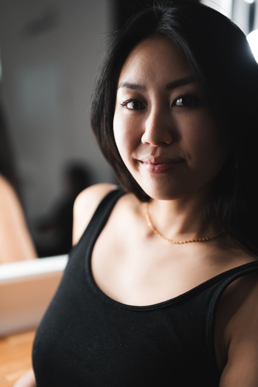 Elegant portrait of a young woman in a Hamburg studio, embodying beauty and confidence.