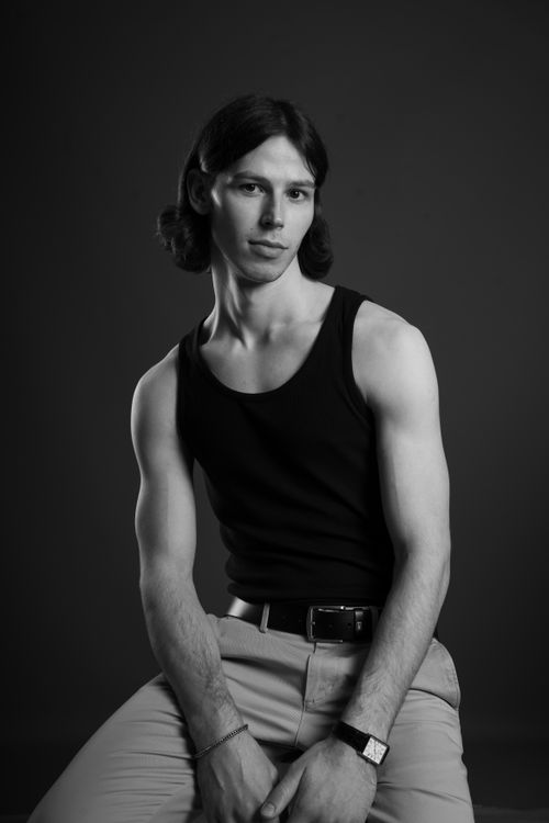 Free Black and white studio portrait of an adult male wearing a tank top Stock Photo