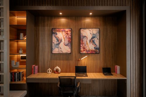 Free Stylish wooden home office with artistic decor and minimalistic furniture in Jakarta. Stock Photo