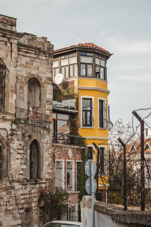 Free Explore the contrast between historic and modern architecture in this urban setting. Stock Photo