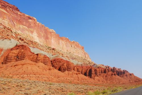 Free Vibrant red rock formations under a bright blue sky, showcasing nature's beauty. Stock Photo