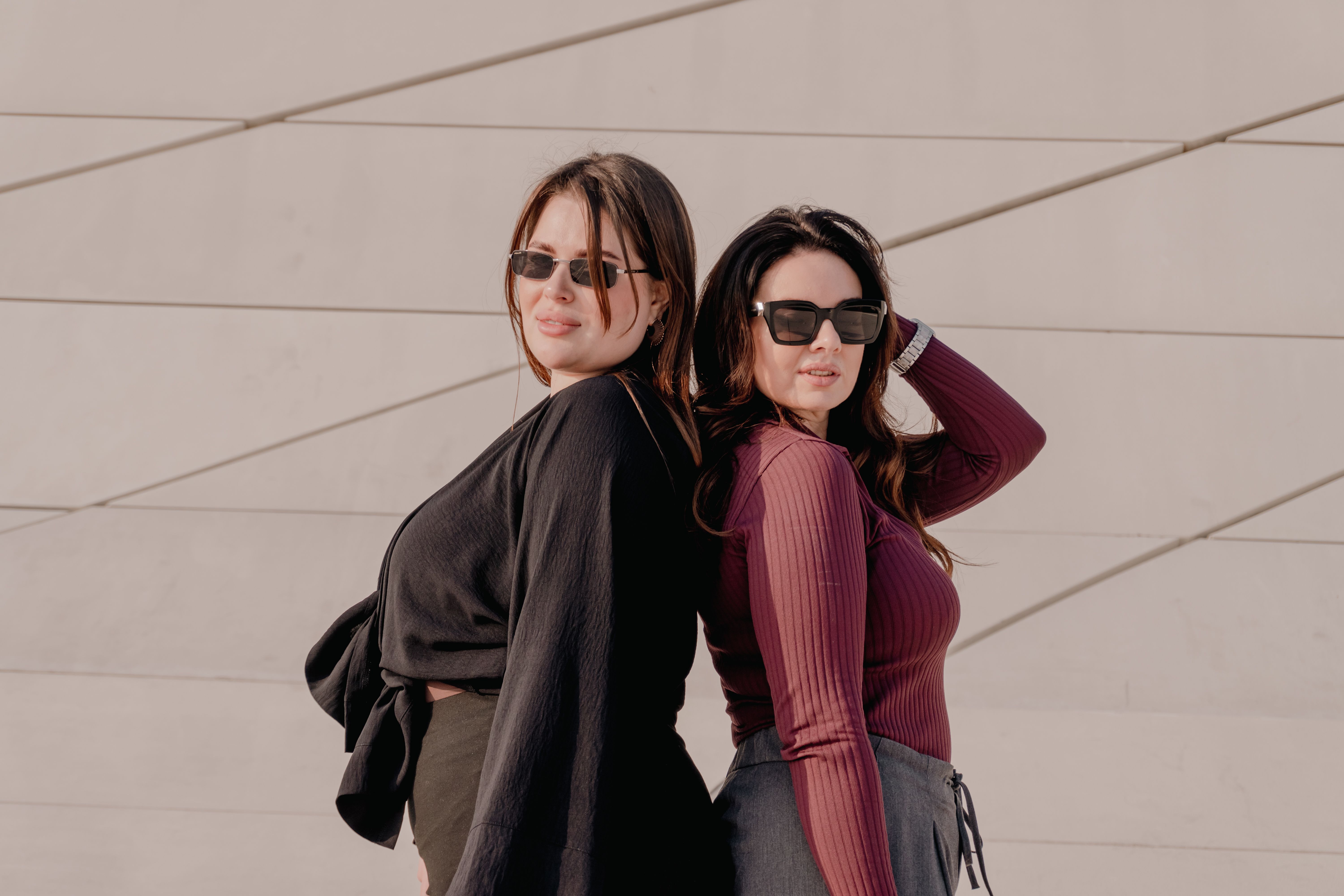 Fashionable Women Posing Outdoors in Sunglasses · Free Stock Photo