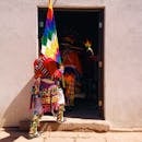 Anonymous local person with wiphala flag