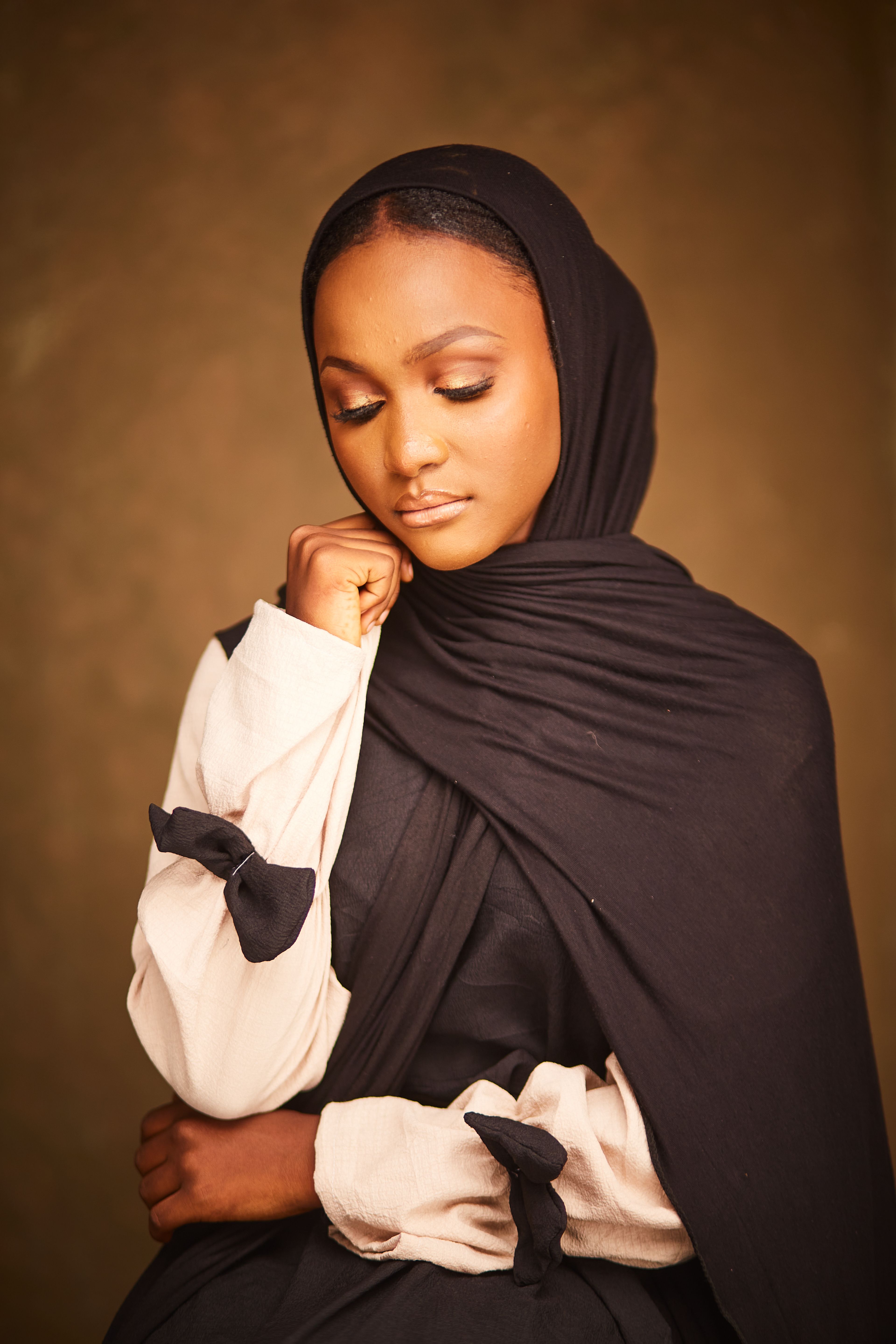 Elegant Portrait of a Woman in Black Hijab · Free Stock Photo