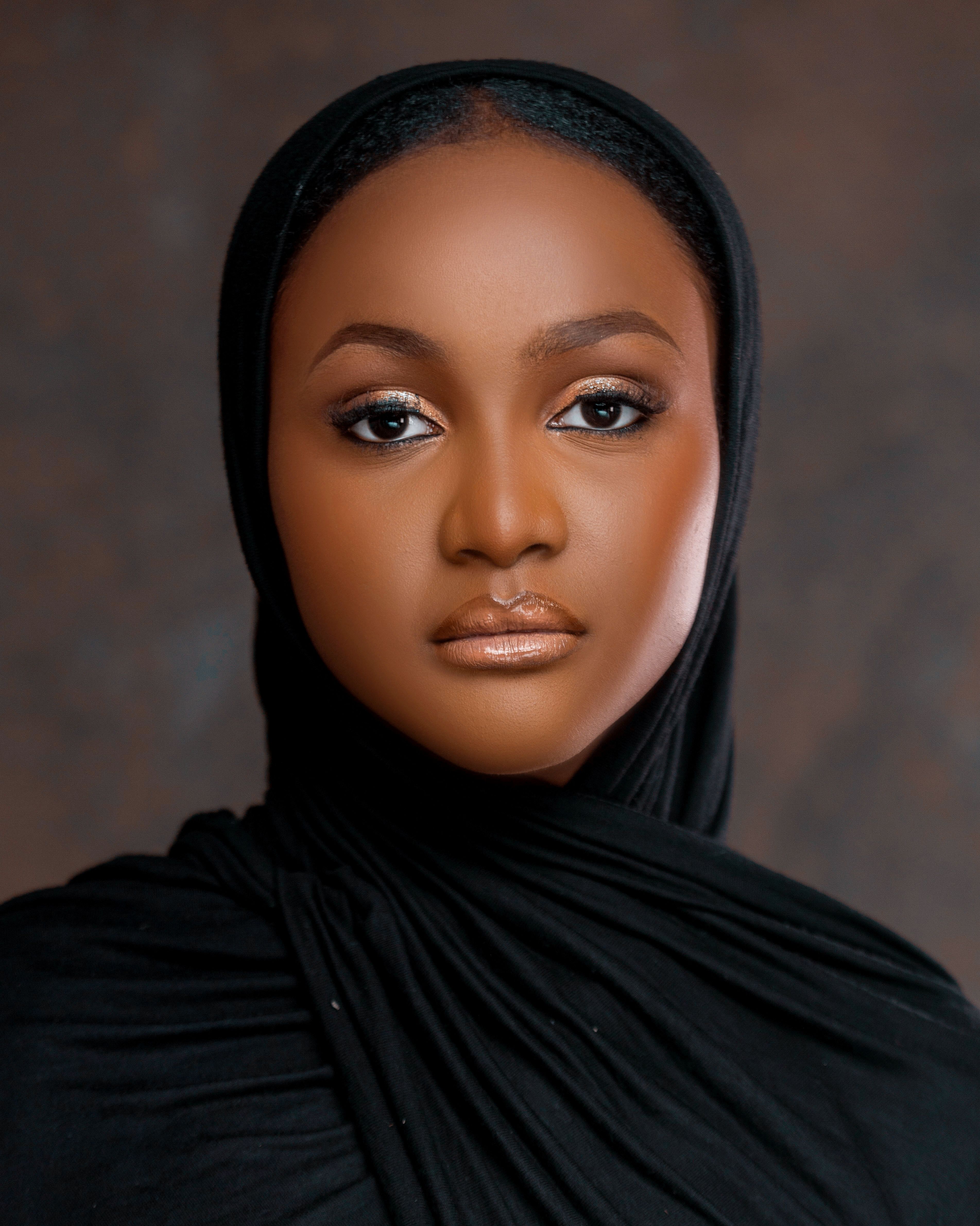 Portrait of a Woman in Black Hijab with Makeup · Free Stock Photo