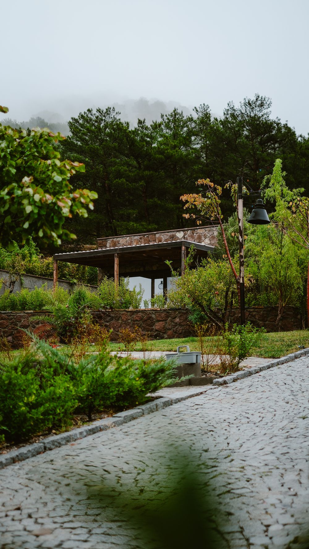 Stone pathway and hardscape construction through landscaped grounds