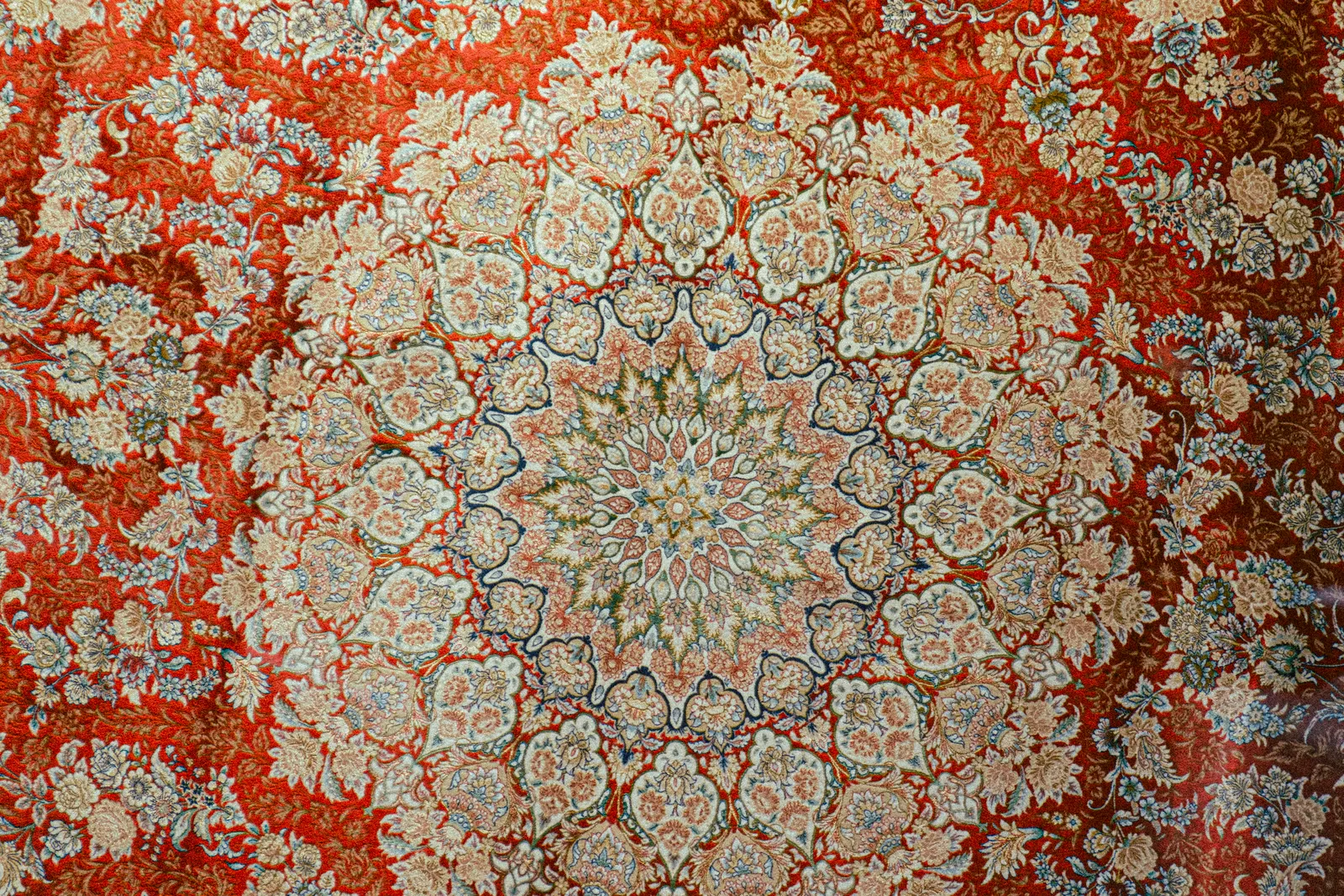 Statement patterned rug creating a strong focal point in a luxury interior