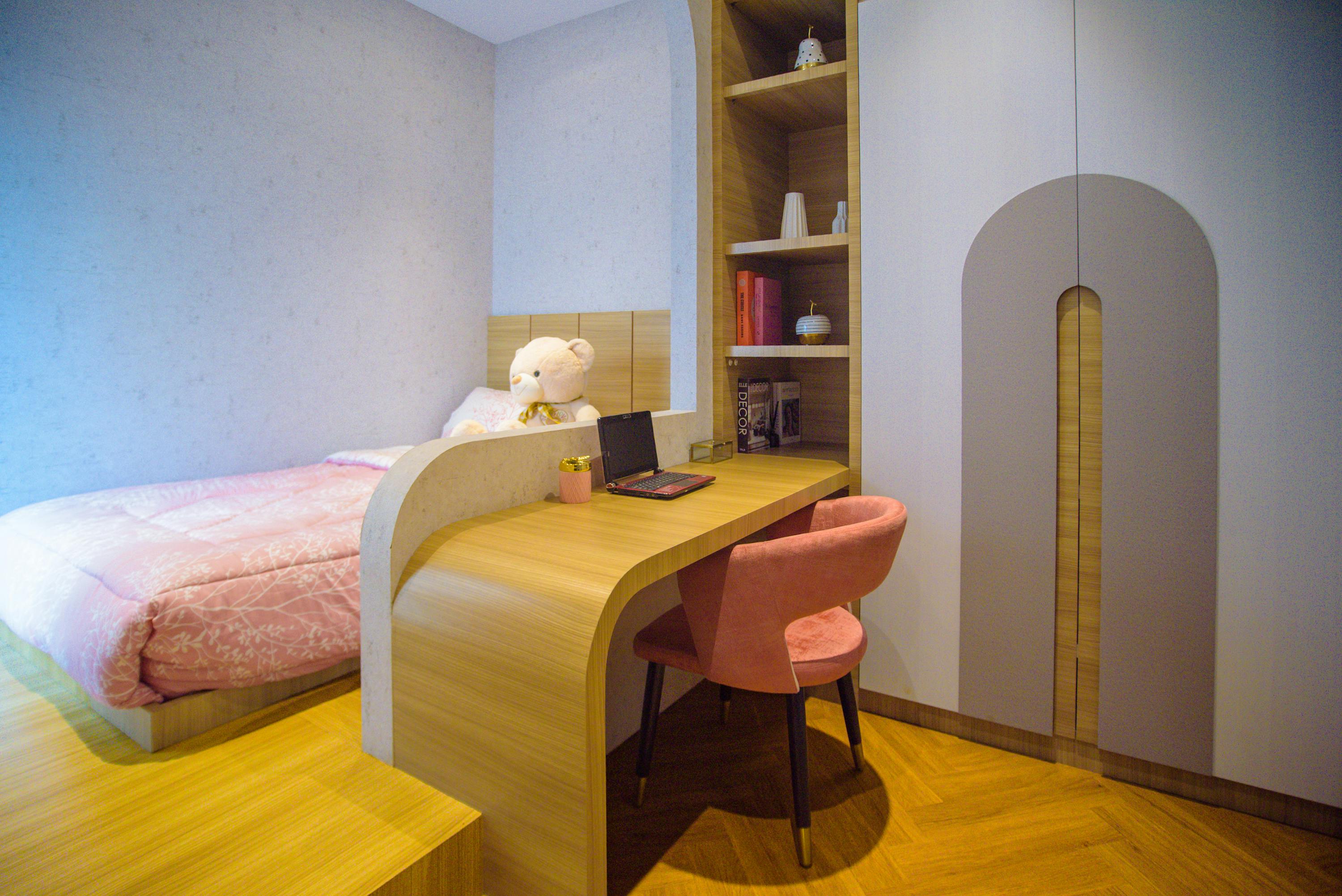 Multi-functional Bedroom With A Small Armchair And Writing Desk In A Cozy Setting
