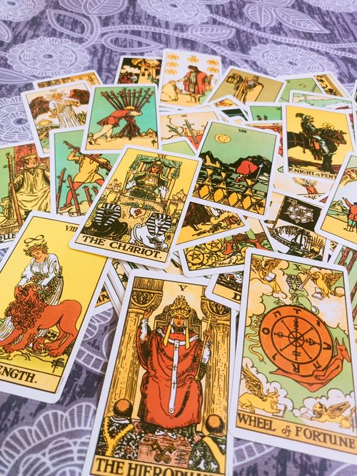 Free A colorful spread of various tarot cards perfect for divination and spiritual guidance. Stock Photo