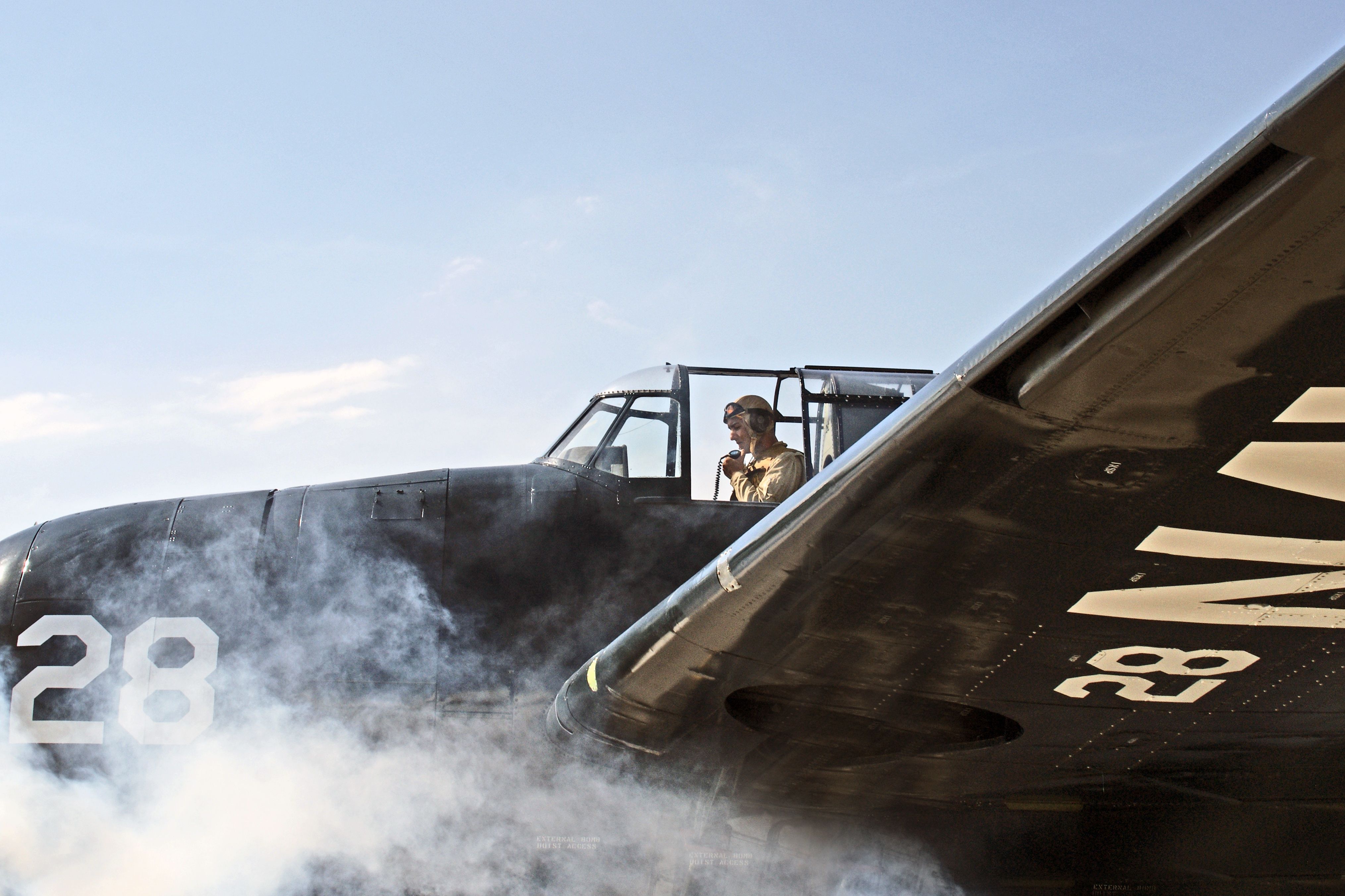 Historic TBM Avenger with Pilot in Flight Gear · Free Stock Photo