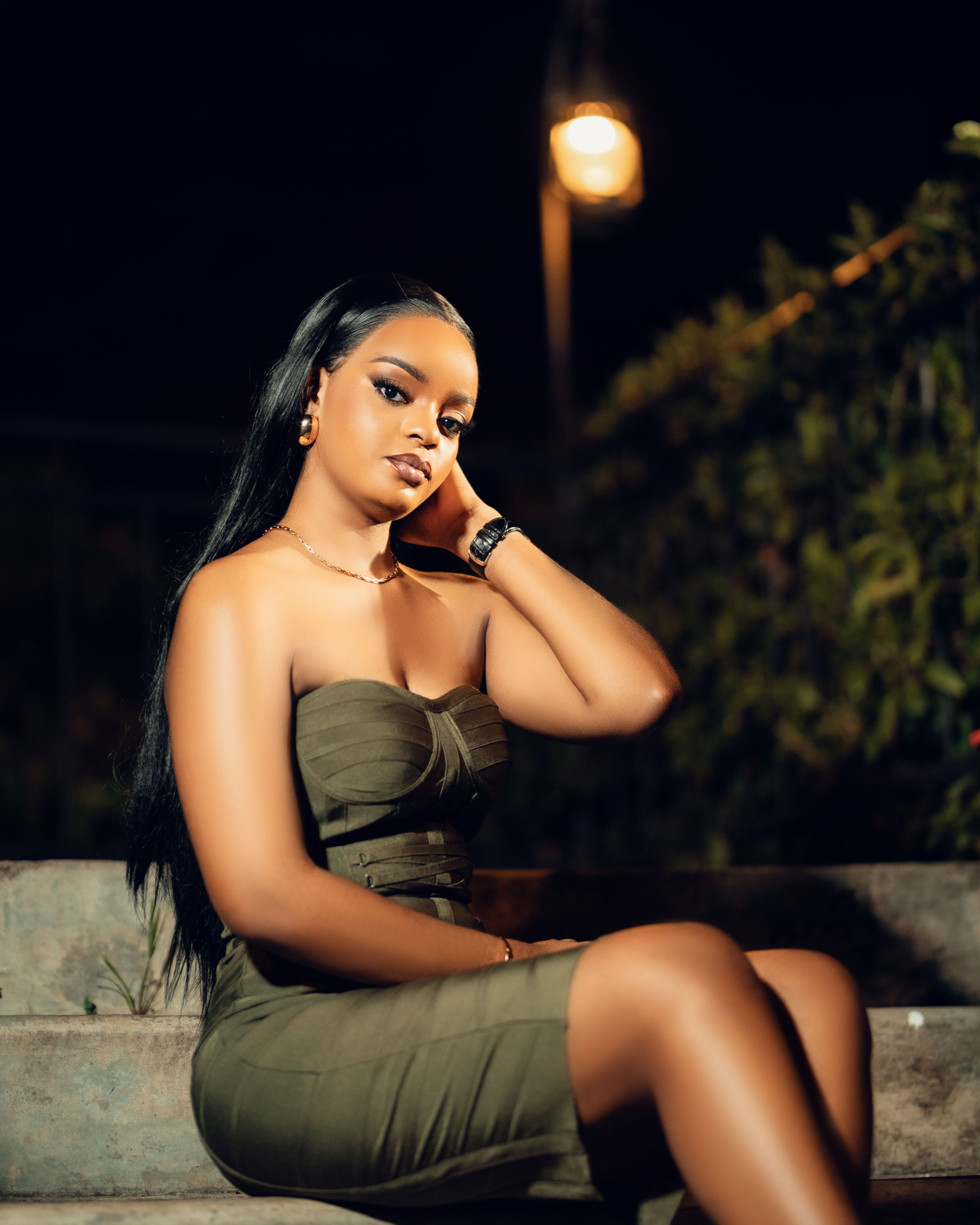 Elegant Woman Posing Outdoors at Night · Free Stock Photo